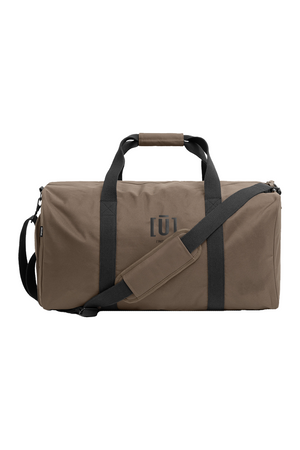 Brown bag with black straps on a white background